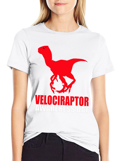 Camiseta Negra Dinosaurio Velociraptor Día de Concienciación