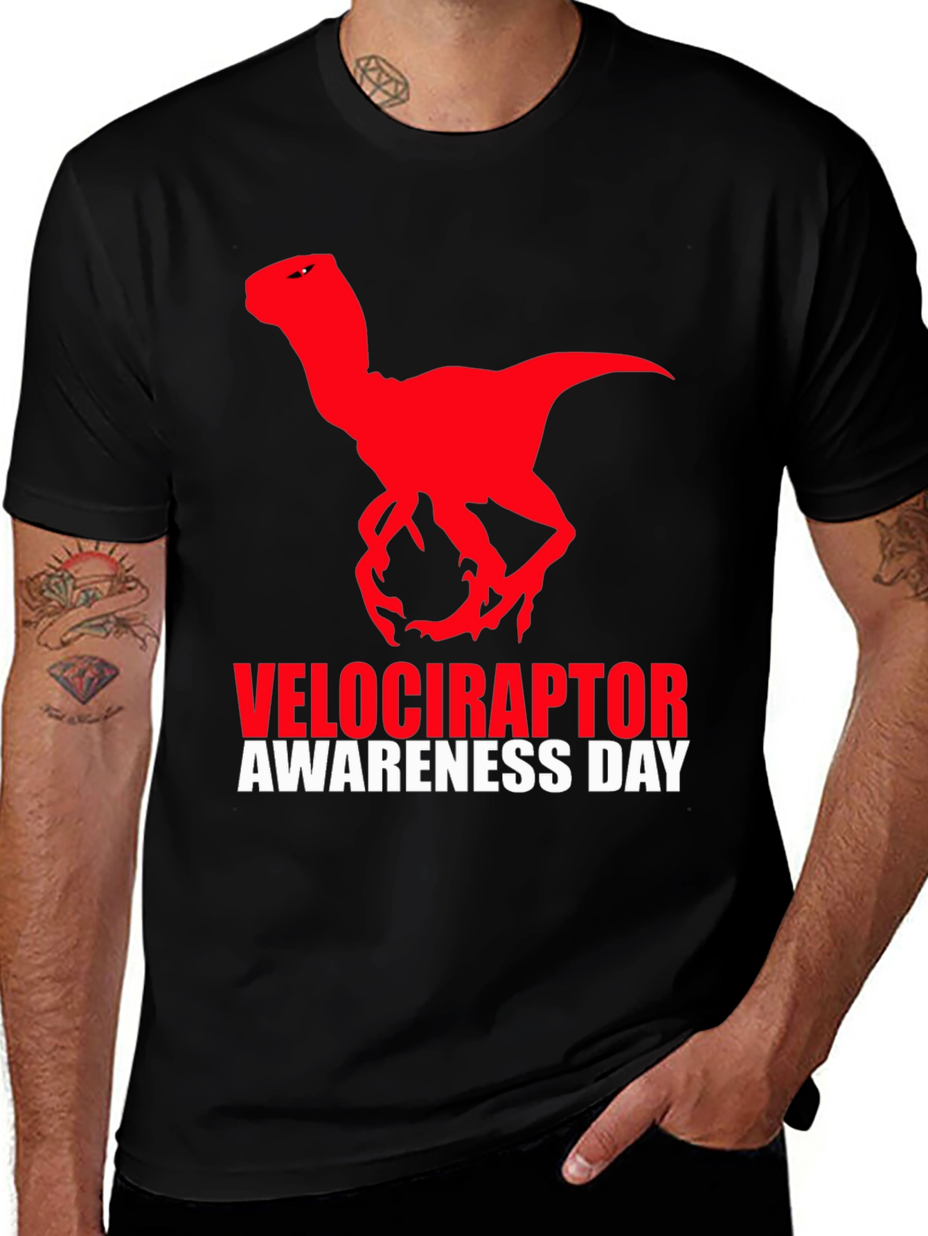 Camiseta Negra Dinosaurio Velociraptor Día de Concienciación