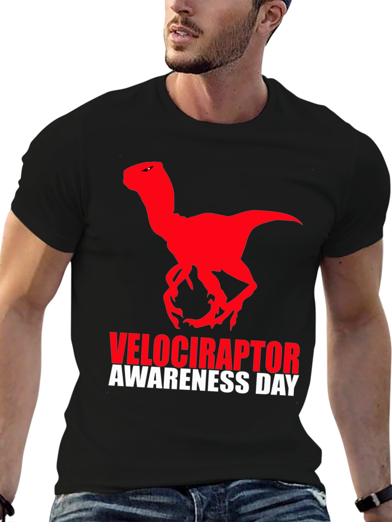 Camiseta Negra Dinosaurio Velociraptor Día de Concienciación