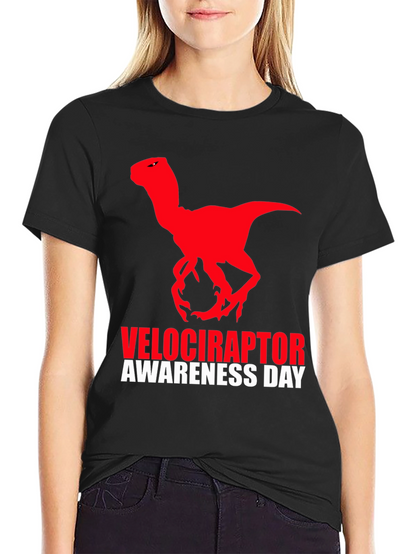 Camiseta Negra Dinosaurio Velociraptor Día de Concienciación